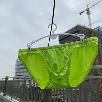Seksīgi Vīriešu Biksītes apakšveļa Kravu cuecas Bikini Biksītes Man Somiņā Apakšbikses zems viduklis māšele Jockstrap Slīdēšanas siksnas Apakšveļa